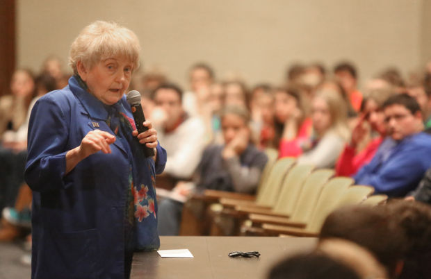 Holocaust survivor Eva Mozes Kor speaks to 8th graders at Valparaiso High School's auditorium.